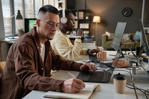 Team Lead Reviewing Code Photos