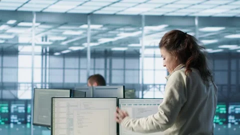 Team leader discussing with data center employees, making announcement Stock Footage 319252547