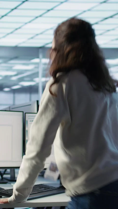 Team leader discussing with data center employees, making announcement Stock Footage 319572717