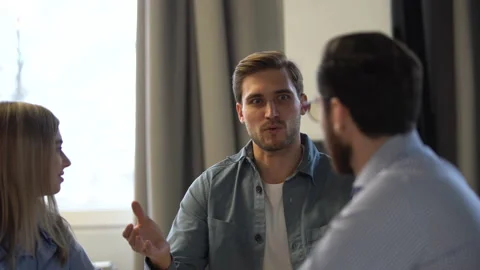 Team leader explaining new project, corporate team coworkers having fun talking Stock Footage 171792850