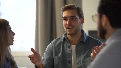 Team leader explaining new project, corporate team coworkers having fun talking Stock Footage 171793122