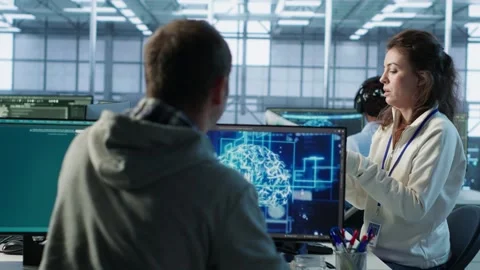 Team leader supervising engineer making software producing AI videos Stock Footage 319268269