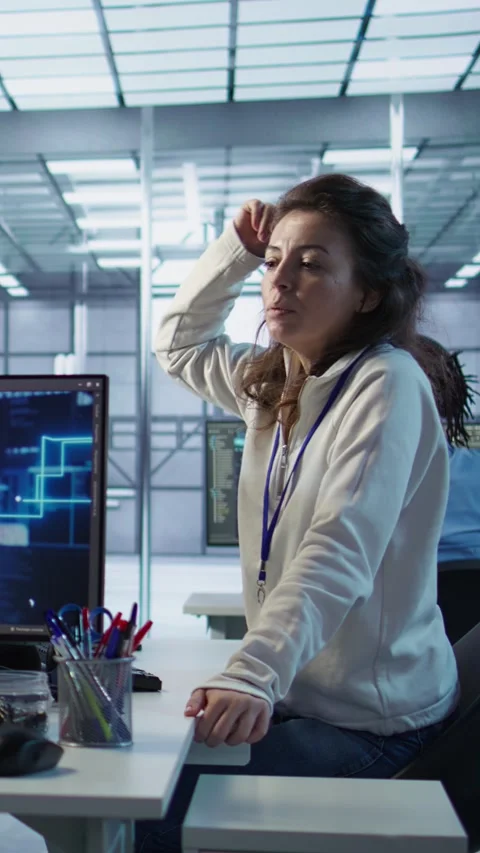 Team leader supervising engineer making software producing AI videos Stock Footage 319560131