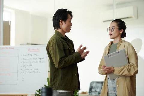 Team Leader Talking to Developer Stock Photos