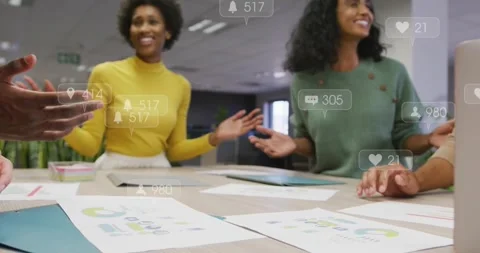 Team leaning and placing hands together after notifications appearing, signaling Stock Footage 333019090