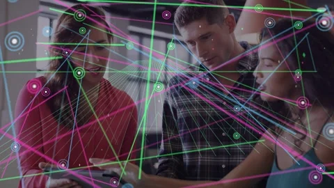 Team leaning around tablet, left woman tapping screen, node network converging Stock Footage 333735290