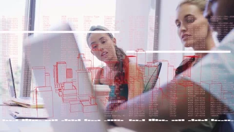 Team leaning in at laptop, man activating red AR city wireframe over group for Stock Footage 331270210