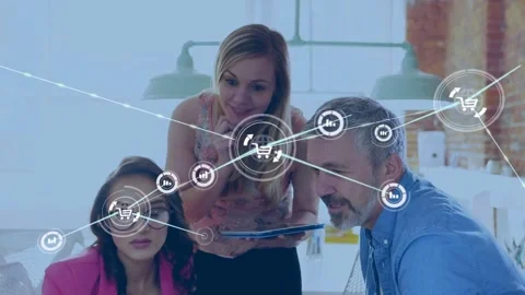 Team leaning over tablet circular data node appearing over tablet forming cart 動画素材 333833615