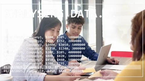 Team leaning at table ANALYSING DATA overlay showing sharing notes pointing Stock Footage 334703019