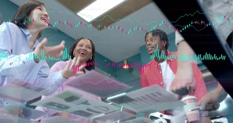 Team leaning under glass checking design mocks as PM reaching sparking chart Stock Footage 334176558