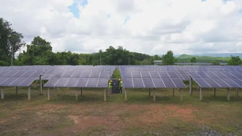 A team of male workers is about to install solar panels. Stock Footage 210817719
