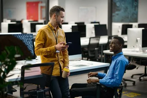 Team of managers at their workplaces in IT office Stock Photos