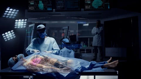 Team of Medical Surgeons use Augmented Holographic Technology. Video stock 122597064