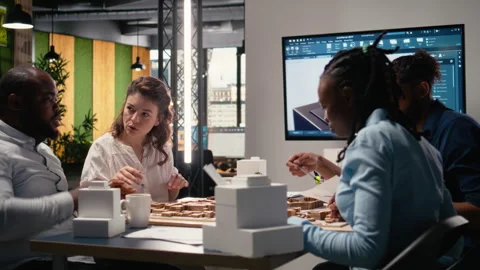 Team members work together in office with architectural software Stock Footage 316795227