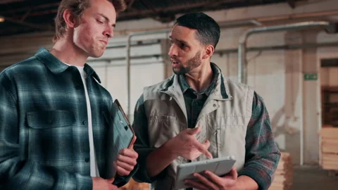 Team, men and talking with tablet in carpentry for production progress, project Stock Footage 338046250