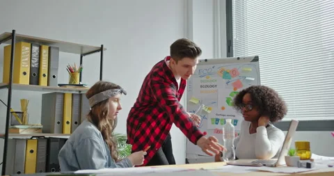 A team of multiracial young man compares plastic and glass to solve Video stock 154674266