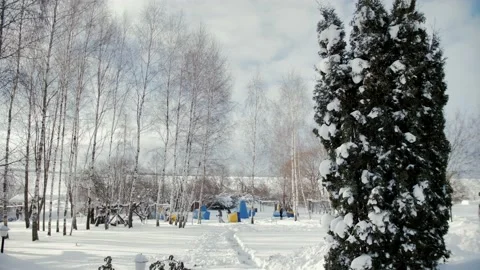 Team of paintball players walking through snow in winter holding paintball guns Stock Footage 231807974