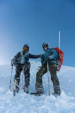 Team on the peak of mountain Stock Photos