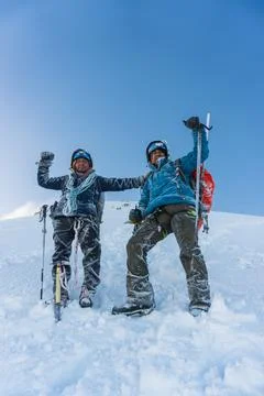 Team on the peak of mountain Stock Photos