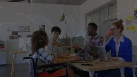 Team planning in office, holographic globe appearing then morphing into network Stock Footage 331735911