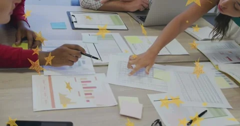 Team pointing and tracing spreadsheet, pen tapping initiating business data Stock Footage 331176117
