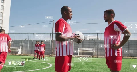 Team practicing soccer drills on turf, showing floating social media icons for Stock Footage 307548155