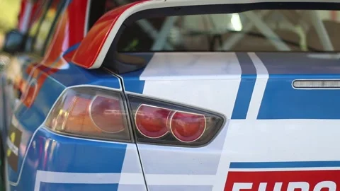 Team prepares the car for start, on Rally Stock Footage 144551014