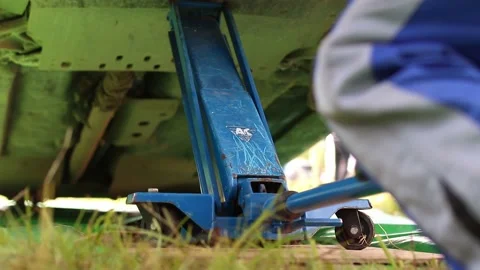 Team prepares the car for start, on Rally Stock Footage 144554801