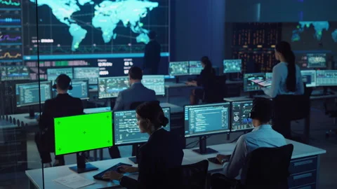 Team of Professional Computer Data Science Engineers Work on PCs in Control Room Stock Footage 135924111