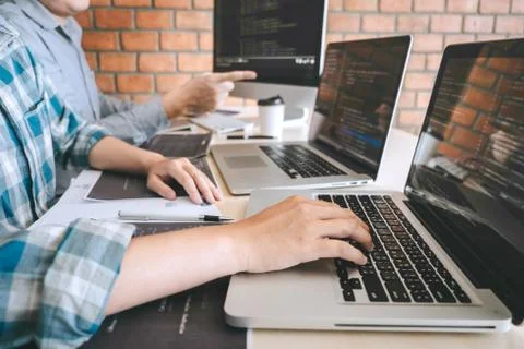 Team of Professional Developer programmer cooperation meeting and brainstormi Stock Photos