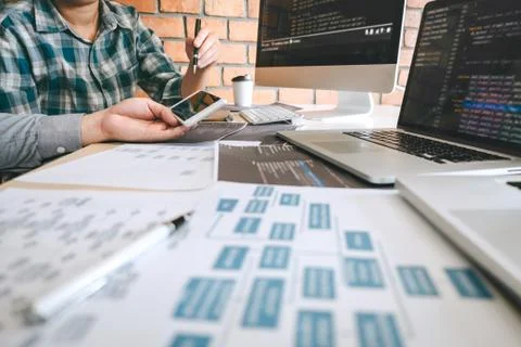 Team of Professional Developer programmer cooperation meeting and brainstormi Stock Photos