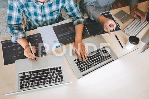 Team of Professional Developer programmer cooperation meeting and brainstormi Stock Photos