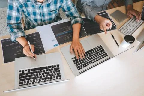 Team of Professional Developer programmer cooperation meeting and brainstormi Stock Photos