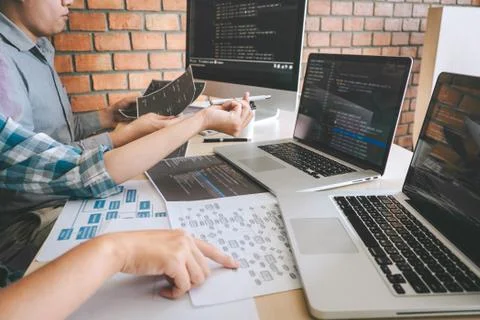 Team of Professional Developer programmer cooperation meeting and brainstormi Stock Photos