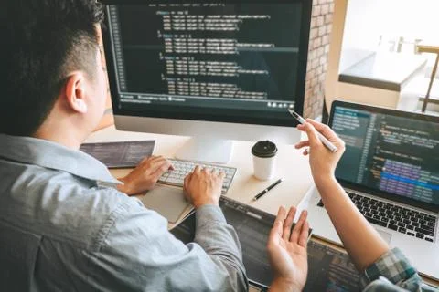 Team of Professional Developer programmer cooperation meeting and brainstormi Stock Photos