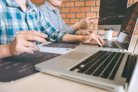 Team of Professional Developer programmer cooperation meeting and brainstormi Stock Photos