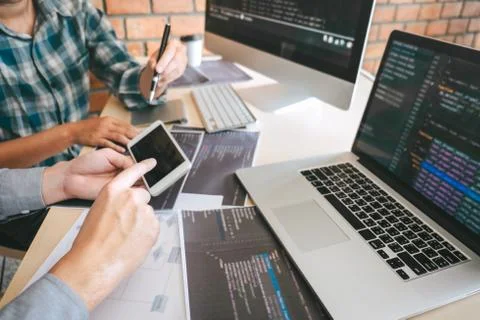 Team of Professional Developer programmer cooperation meeting and brainstormi Stock Photos