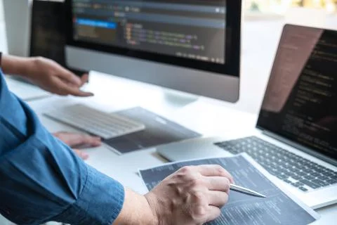 Team of Professional Developer programmer cooperation meeting and brainstormi Stock Photos