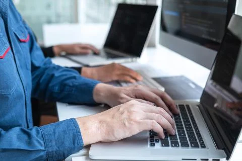 Team of Professional Developer programmer cooperation meeting and brainstormi Stock Photos