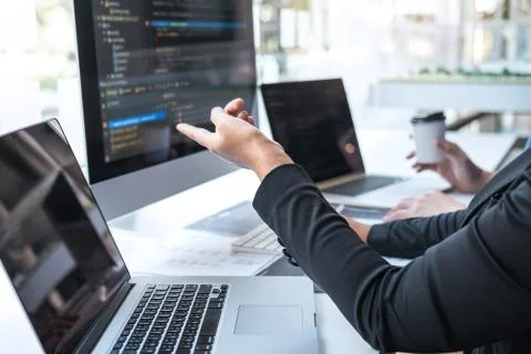 Team of Professional Developer programmer cooperation meeting and brainstormi Stock Photos