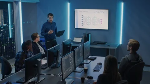 Team of Professional IT Developers Have a Meeting, Speaker Talks about New Block Stock Footage 103277723