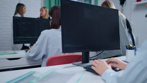 Team Of Professional IT Specialists And Programmers Developing Software In Video stock 274406071