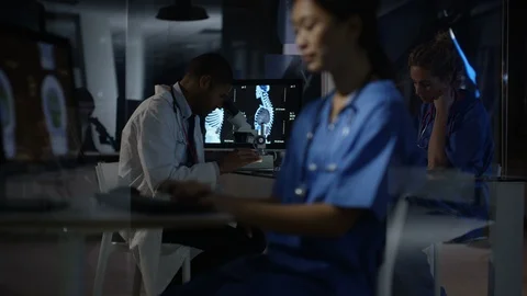 Team of professional scientists work in the Brain Research Laboratory Stock Footage 106739470