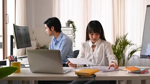 Team of professional web developer working on application software design Stock Photos