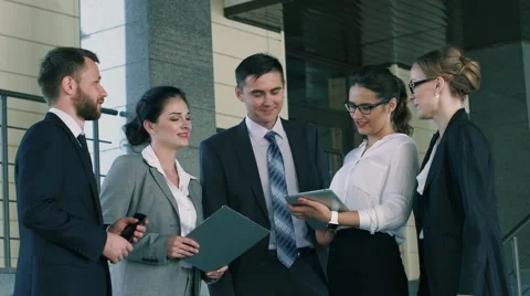 Team of professionals brainstorming over a project that they are going Stock-Footage 68036960