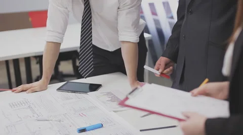 Team of professionals discusses the project Stock Footage 59851131