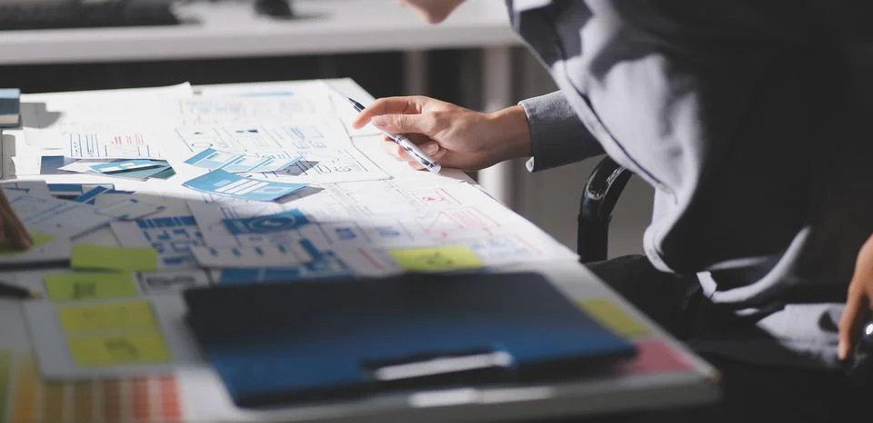 Team of Program Developer Collaborating on UXUI Design Planning in a Modern.. Stock Photos