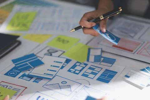 Team of Program Developer Collaborating on UXUI Design Planning in a Modern.. Stock Photos