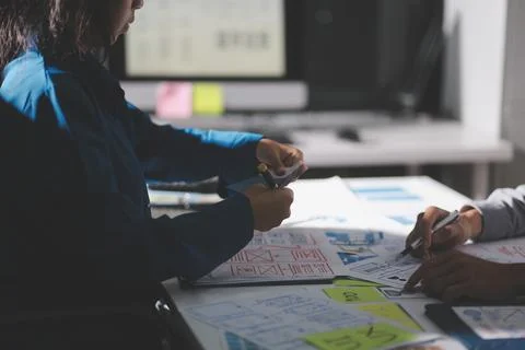 Team of Program Developer Collaborating on UXUI Design Planning in a Modern.. Stock Photos