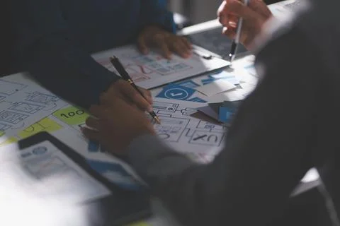 Team of Program Developer Collaborating on UXUI Design Planning in a Modern.. Stock Photos